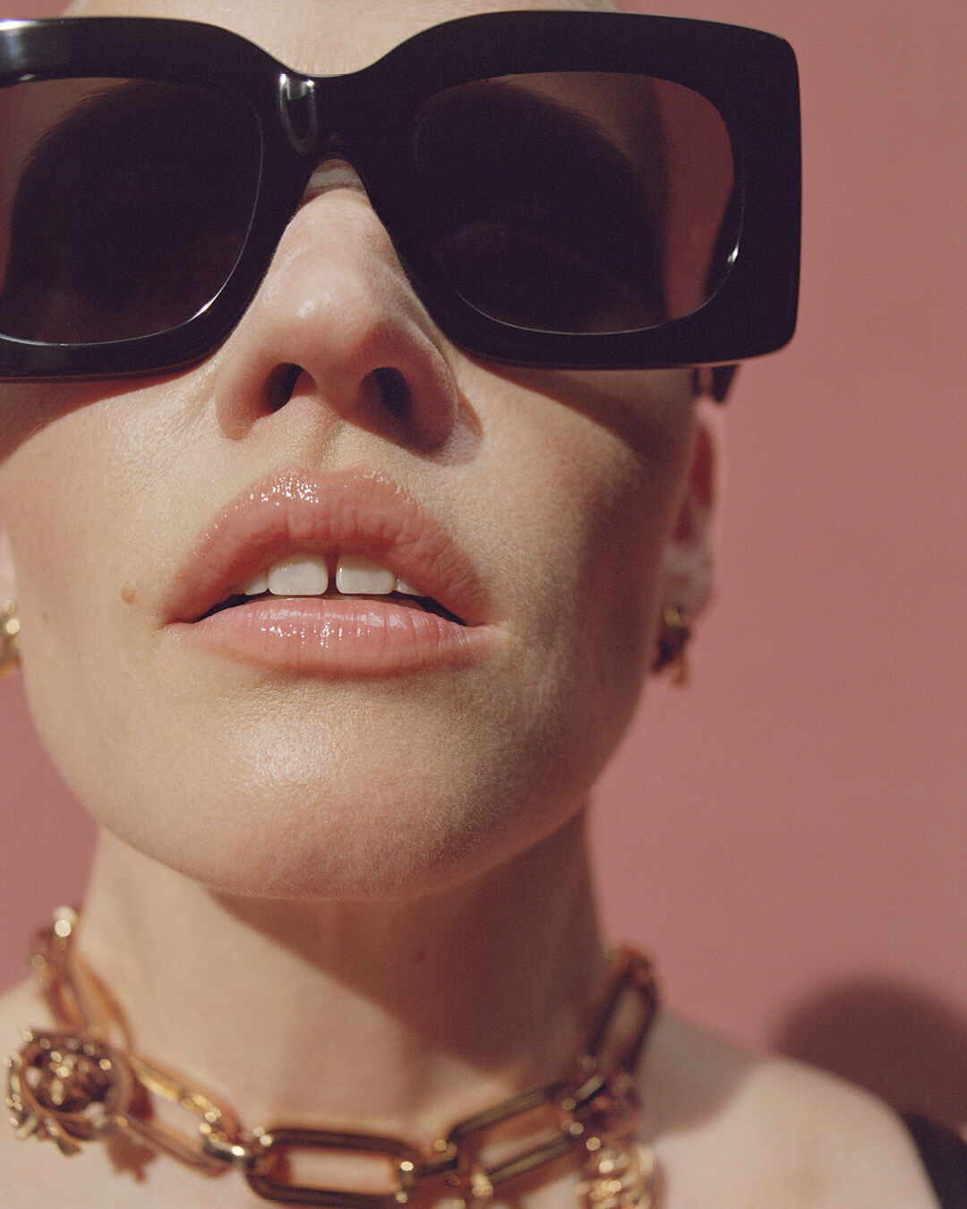 Lara Stone in black Versace sunglasses